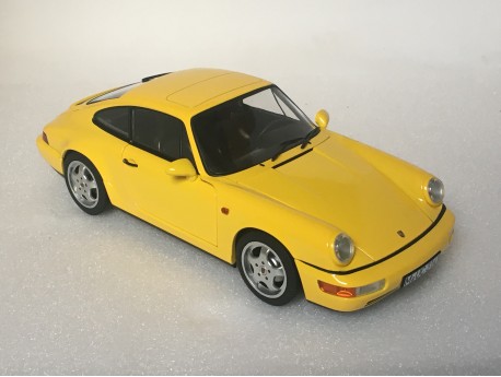 187328 Porsche 964 Carrera 2 Coupe Geel 1990. Norev 1:18